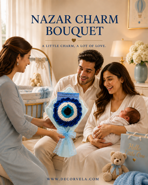A family in a warmly lit nursery receives a handmade crocheted bouquet with a blue and white circular flower design and a blue card. The text at the top reads 'NAZAR CHARM Bouquet' with the tagline 'A LITTLE CHARM, A LOT OF LOVE.